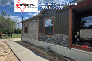 Connex container foundation and BBQ hut base with a smart raised design by Cardinal Concrete.