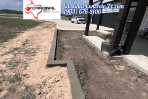 Newly installed concrete flower bed in Kemp Texas