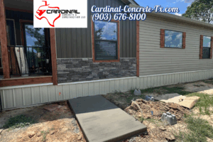 Connex container foundation and BBQ hut base with a smart raised design by Cardinal Concrete.
